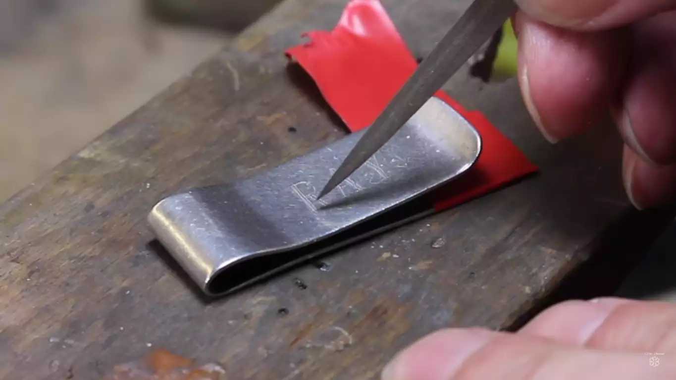 removing laser etching from stainless steel